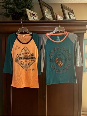 2 American Fighter women’s small/ XS 3/4 Sleeve Raglan Tee’s Teal & Orange